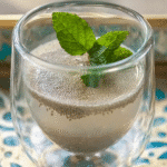 Bariatric Seed Trick: The Viral Weight Loss Hack That Actually Works? 5 Glass of soaked bariatric seeds trick topped with mint leaves on a golden and turquoise patterned tray.