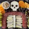 Halloween charcuterie board styled like a spooky skeleton