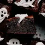 Fudgy chocolate brownies topped with fluffy marshmallow ghosts, the perfect spooky Halloween dessert for kids and adults.
