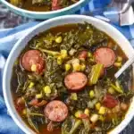 A warm, Southern-style Swamp Soup brimming with smoked sausage, collard greens, beans, and corn — a true comfort meal packed with hearty, home-cooked flavor.