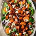 Roasted Sweet Potato Goat Cheese Salad: A Warm, Flavorful Fall Salad Bursting with Texture and Color 5 This Roasted Sweet Potato Goat Cheese Salad is bursting with flavor and texture — sweet roasted potatoes, creamy goat cheese, crunchy pecans, and tangy mandarins come together for the perfect fall salad.