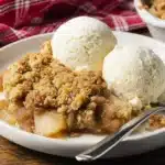 This Apple Crisp with Oats is the perfect cozy dessert — tender baked apples coated in cinnamon sugar and topped with a buttery oat crumble. Serve warm with vanilla ice cream for the ultimate fall treat.