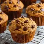 These Pumpkin Chocolate Chip Muffins are moist, fluffy, and bursting with warm spices and melty chocolate chips — a perfect cozy treat for fall mornings.