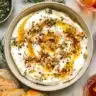 Creamy ricotta dip topped with hot honey, walnuts, and rosemary. A delicious sweet-savory appetizer that’s perfect for parties, holidays, or effortless entertaining.