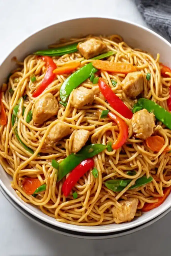 Chicken Lo Mein Recipe A Flavor Packed Weeknight Dinner You Will Make Again And Again 7 Chicken lo mein with stir-fried noodles, vegetables, and tender chicken in a savory sauce.